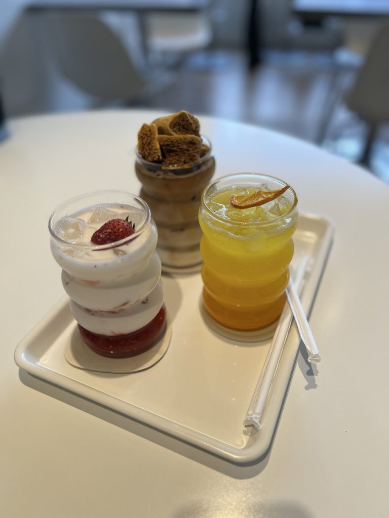 drinks. iced strawberry latte, iced dalgona latte and mango pineapple ade